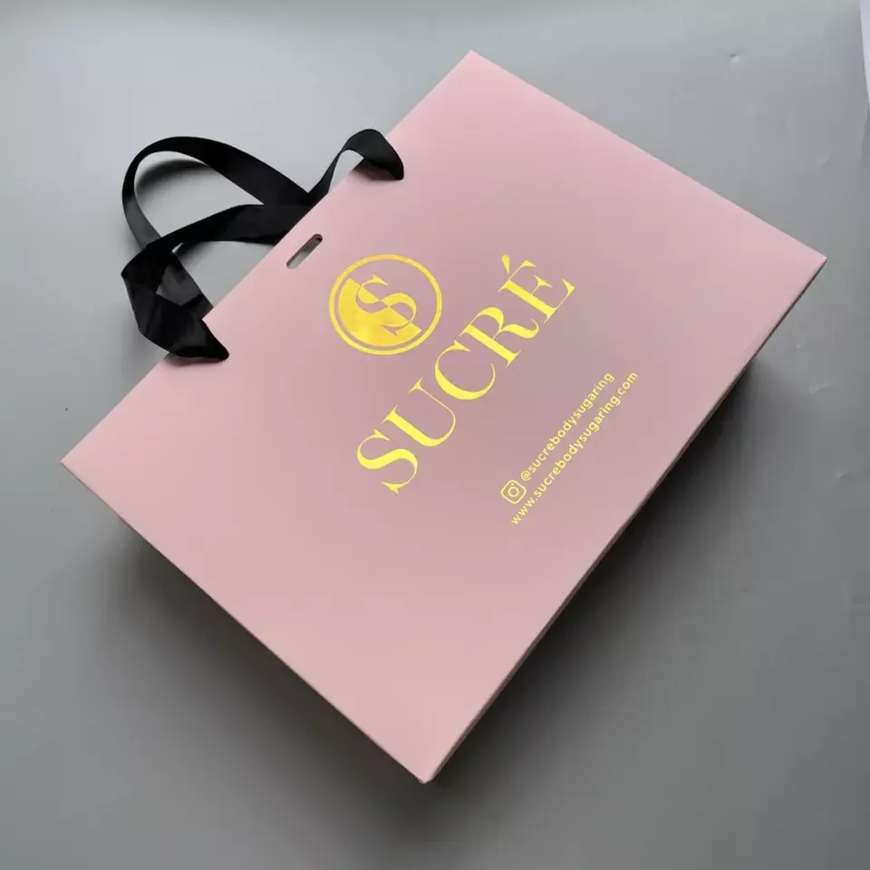 SBS paper bags with silver and gold foiling,